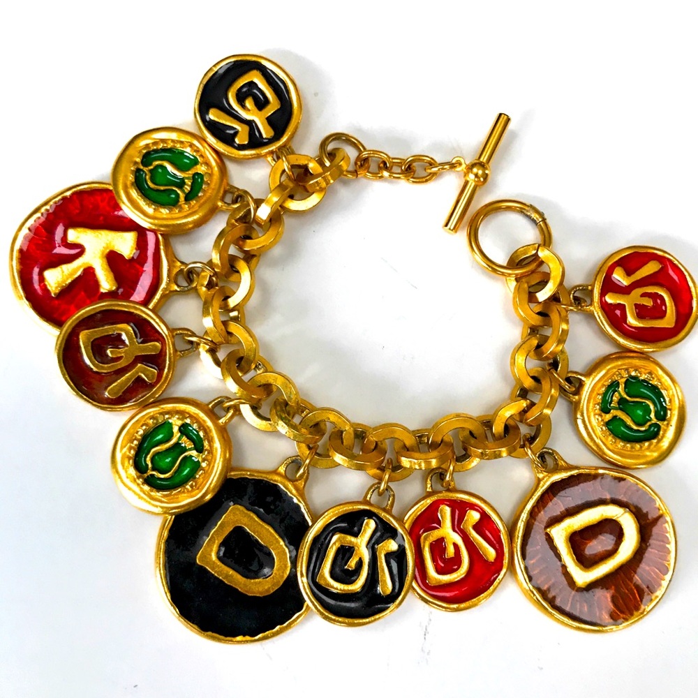 Donna Karan Gold Plated Charm Bracelet.